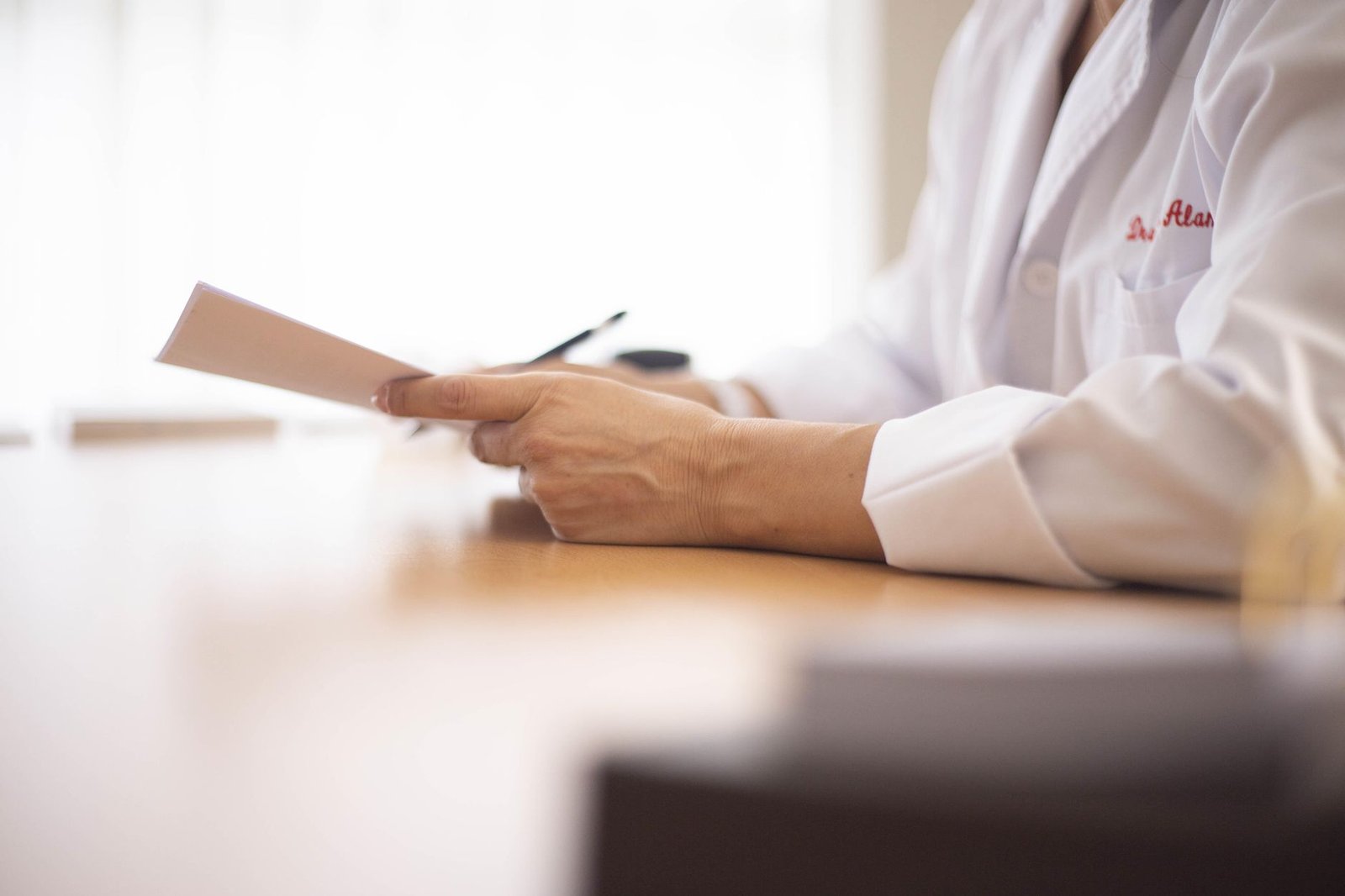 A specialist reviews records and imaging while preparing an independent medical opinion for a VA claim