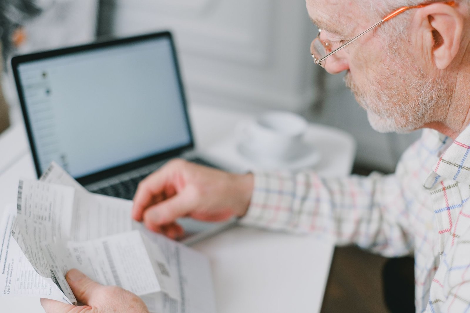 Veteran reviewing a fee agreement covering attorney fees in VA disability claims