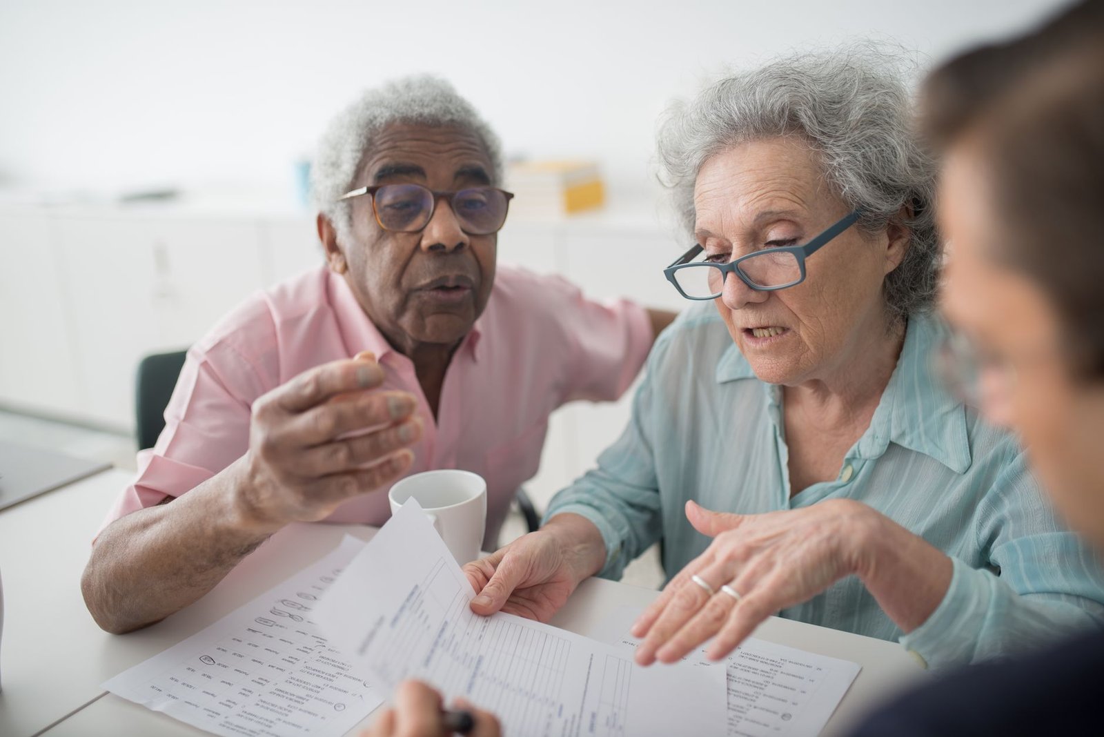 Veteran and spouse discussing a special needs trust for veterans families with an advisor
