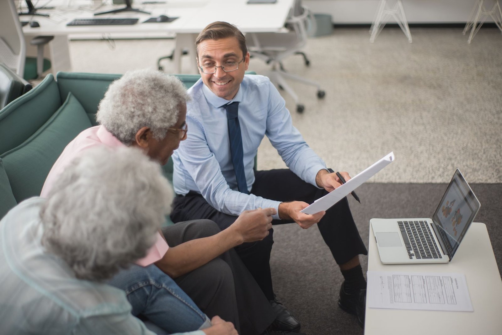 Advisor and veteran reviewing a decision letter before requesting a higher-level review for VA claims