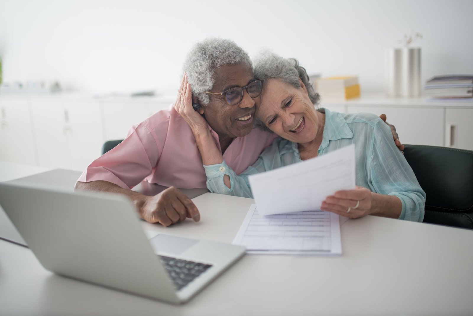 A veteran and spouse organize records to support an independent medical examination for VA claims
