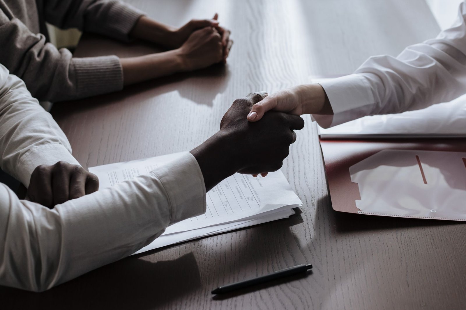 Signing estate planning paperwork that sets up a special needs trust for a veteran's family